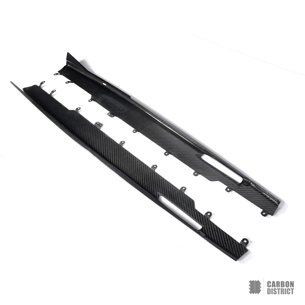 BMW X6M (F96) carbon fibre side skirts — 3K twill gloss finish