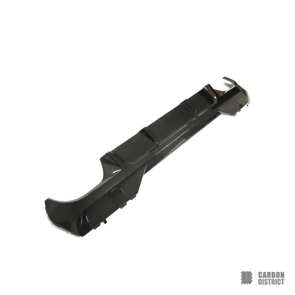 BMW 4 Series (G22/G23) carbon fibre rear diffuser — UV-stable gloss finish detail