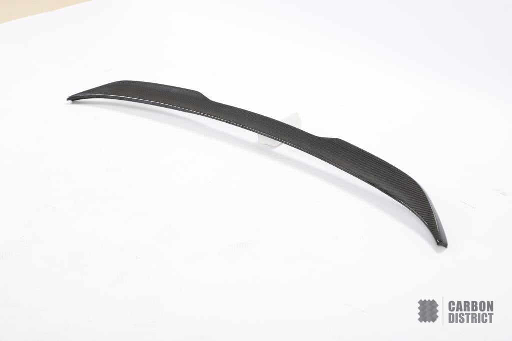 BMW X6M (F96) carbon fibre spoiler — UV-stable gloss finish detail