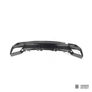 BMW X6M (F96) carbon fibre rear diffuser — UV-stable gloss finish detail
