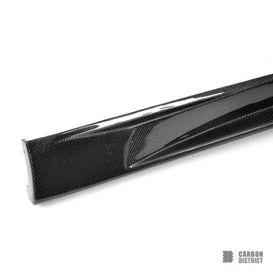 Nissan GT-R (R35) carbon fibre side skirts — UV-stable gloss finish detail