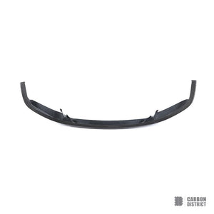 BMW 7 Series (G11/G12) carbon fibre front lip — UV-stable gloss finish detail