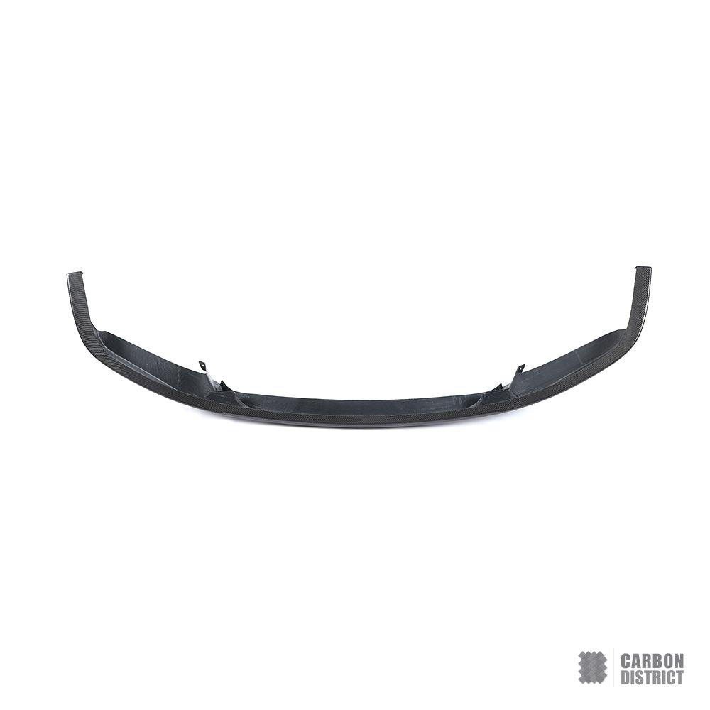 BMW 7 Series (G11/G12) carbon fibre front lip — UV-stable gloss finish detail
