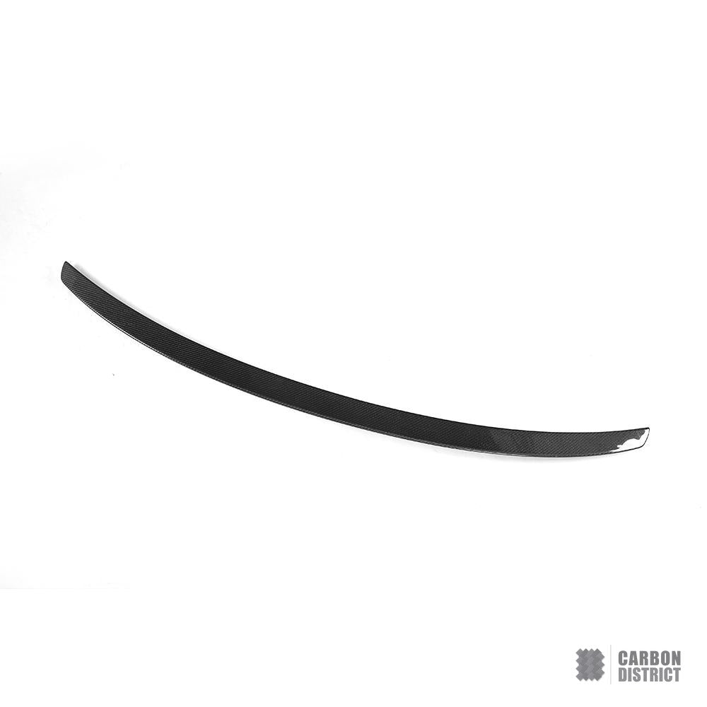 BMW 7 Series (G11/G12) carbon fibre spoiler — UV-stable gloss finish detail