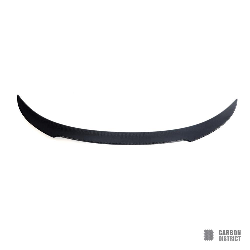 BMW 8 Series (G15/G16) carbon fibre spoiler — UV-stable gloss finish detail