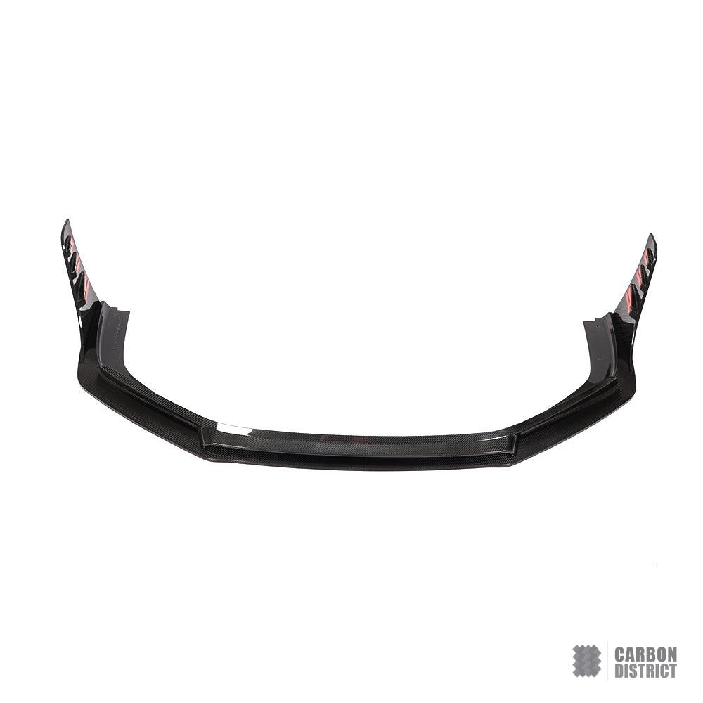 Porsche 911 (991) carbon fibre front lip — UV-stable gloss finish detail