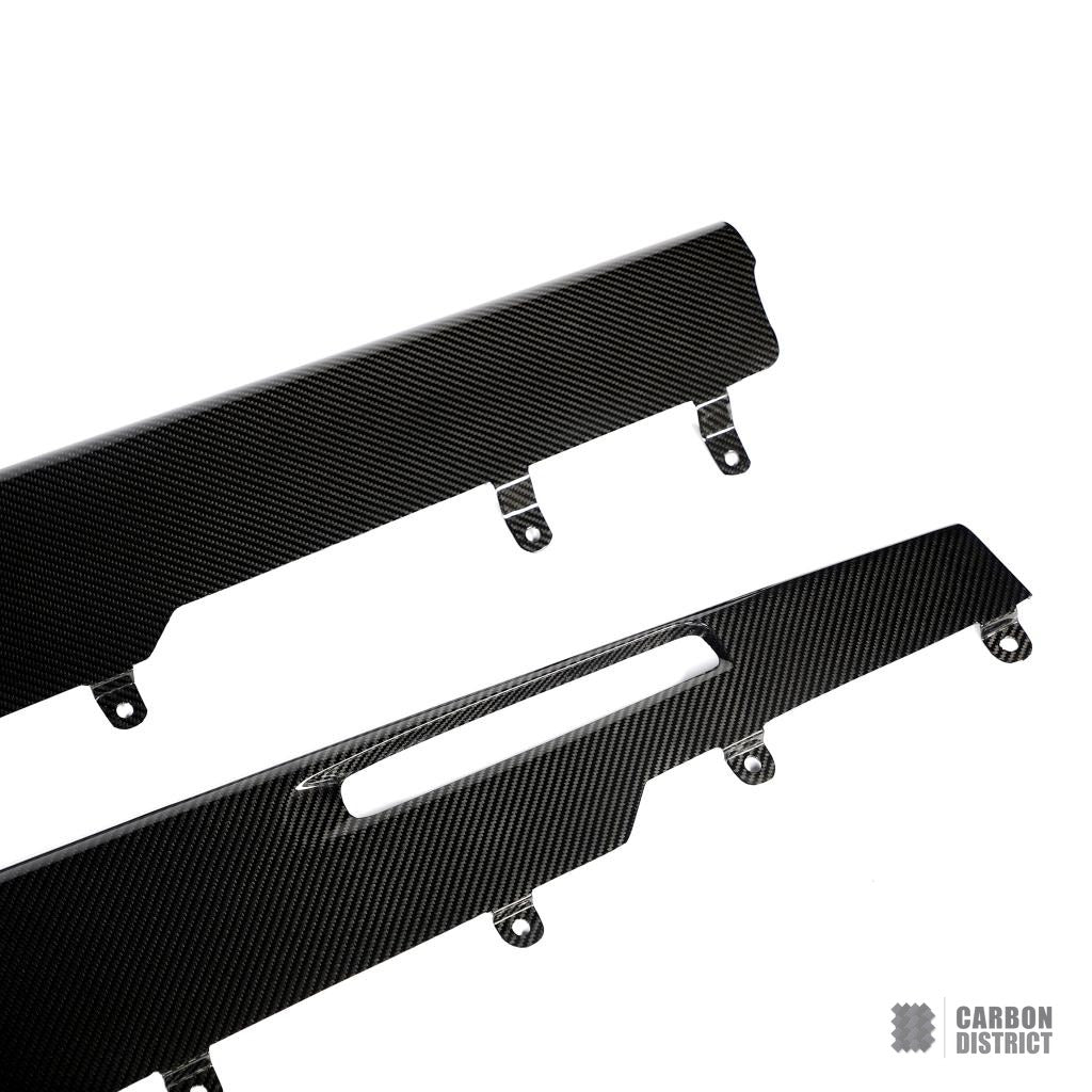 BMW X6M (F96) carbon fibre side skirts — UV-stable gloss finish detail