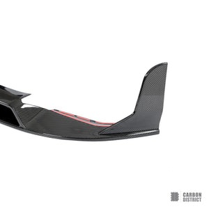 BMW M3/M4 (G80/G82/G83) dry carbon fibre front lip — UV-stable gloss finish detail