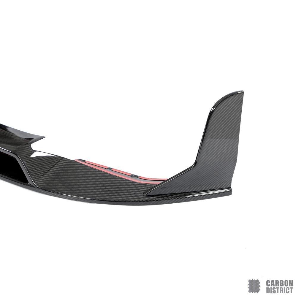 BMW M3/M4 (G80/G82/G83) dry carbon fibre front lip — UV-stable gloss finish detail
