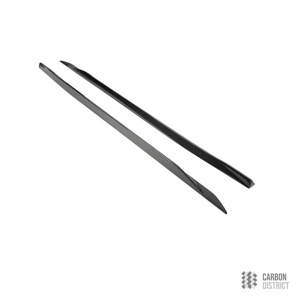 BMW 5 Series / i5 (G60) carbon fibre side skirt extensions — made to order in genuine carbon fibre