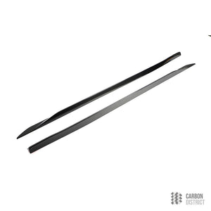 BMW 5 Series / i5 (G60) carbon fibre side skirt extensions — UV-stable gloss finish detail