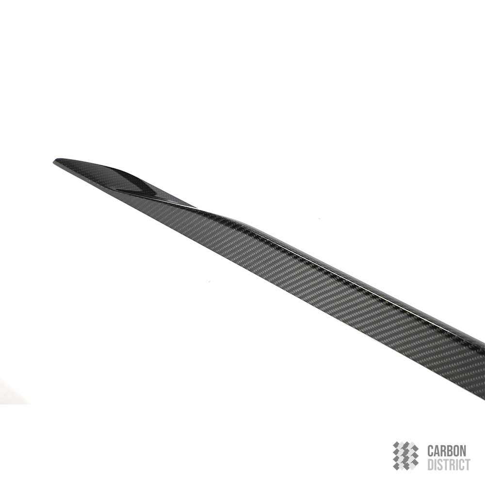 BMW 5 Series / i5 (G60) carbon fibre side skirt extensions — 3K twill gloss finish
