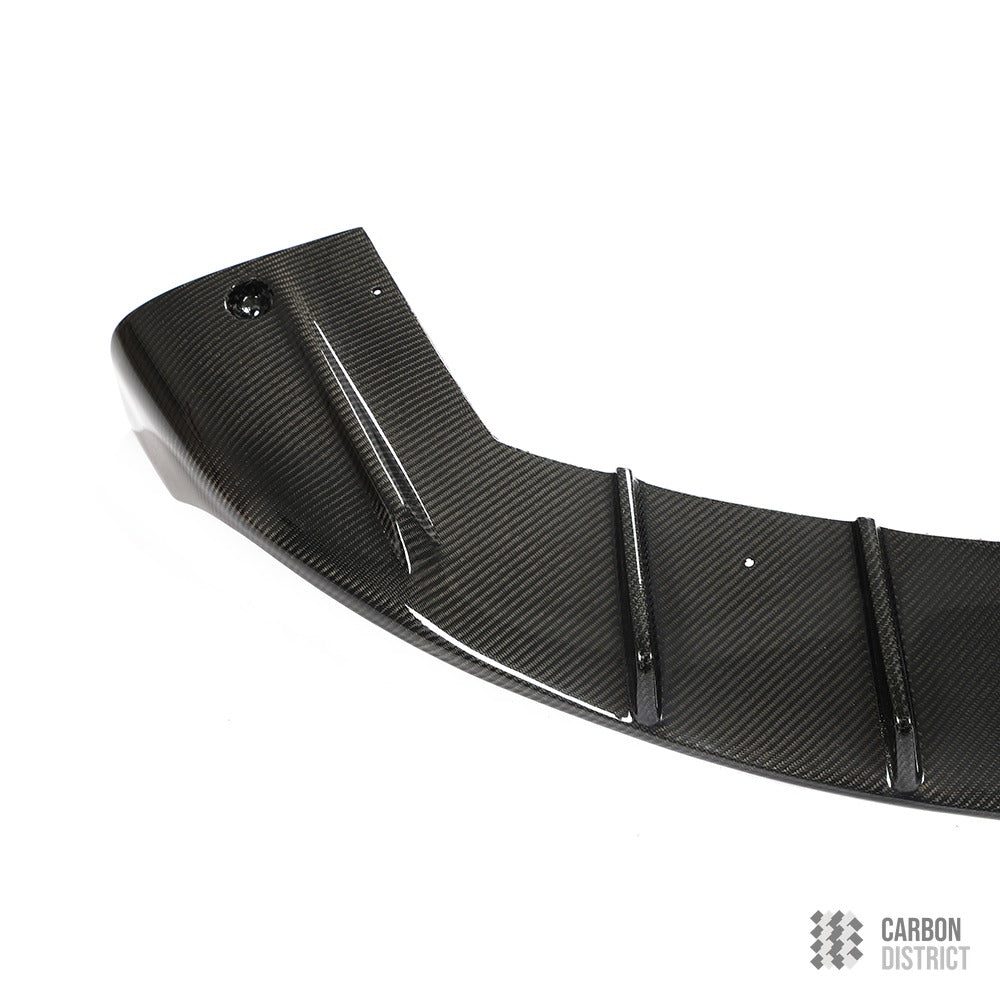 Tesla Model Y carbon fibre rear diffuser — UV-stable gloss finish detail