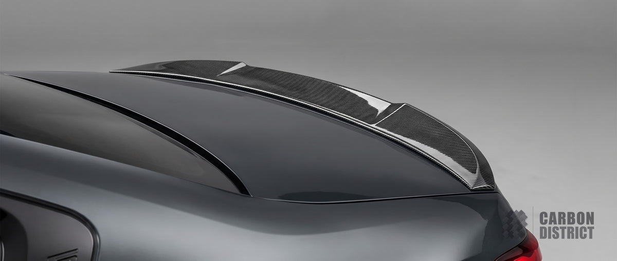 BMW 5 Series/i5/M5 (G60/G90) dry carbon fibre spoiler — UV-stable gloss finish