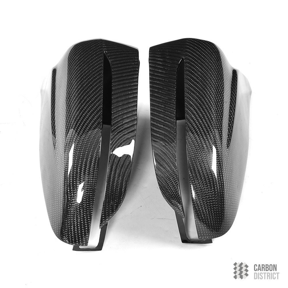 BMW 5 Series (G30) carbon fibre mirror caps — UV-stable gloss finish detail