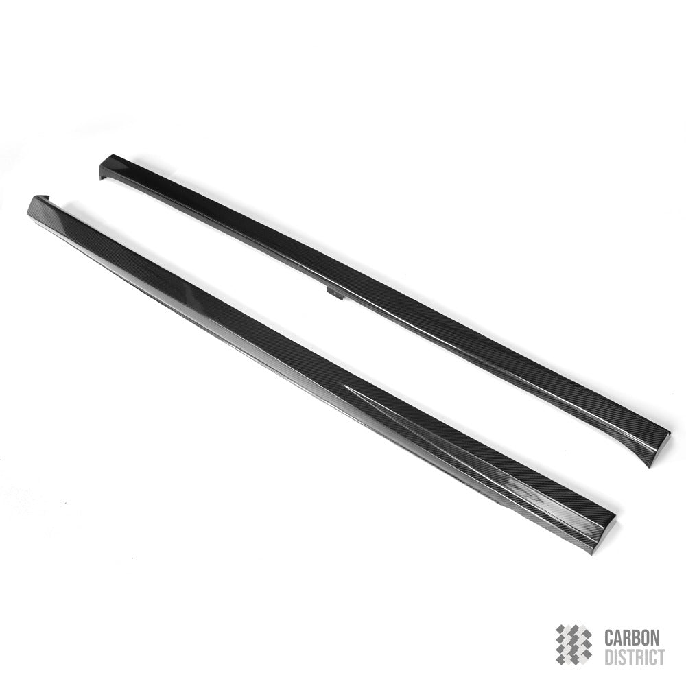 VW Golf (MK7/MK7.5) carbon fibre side skirts — UV-stable gloss finish detail