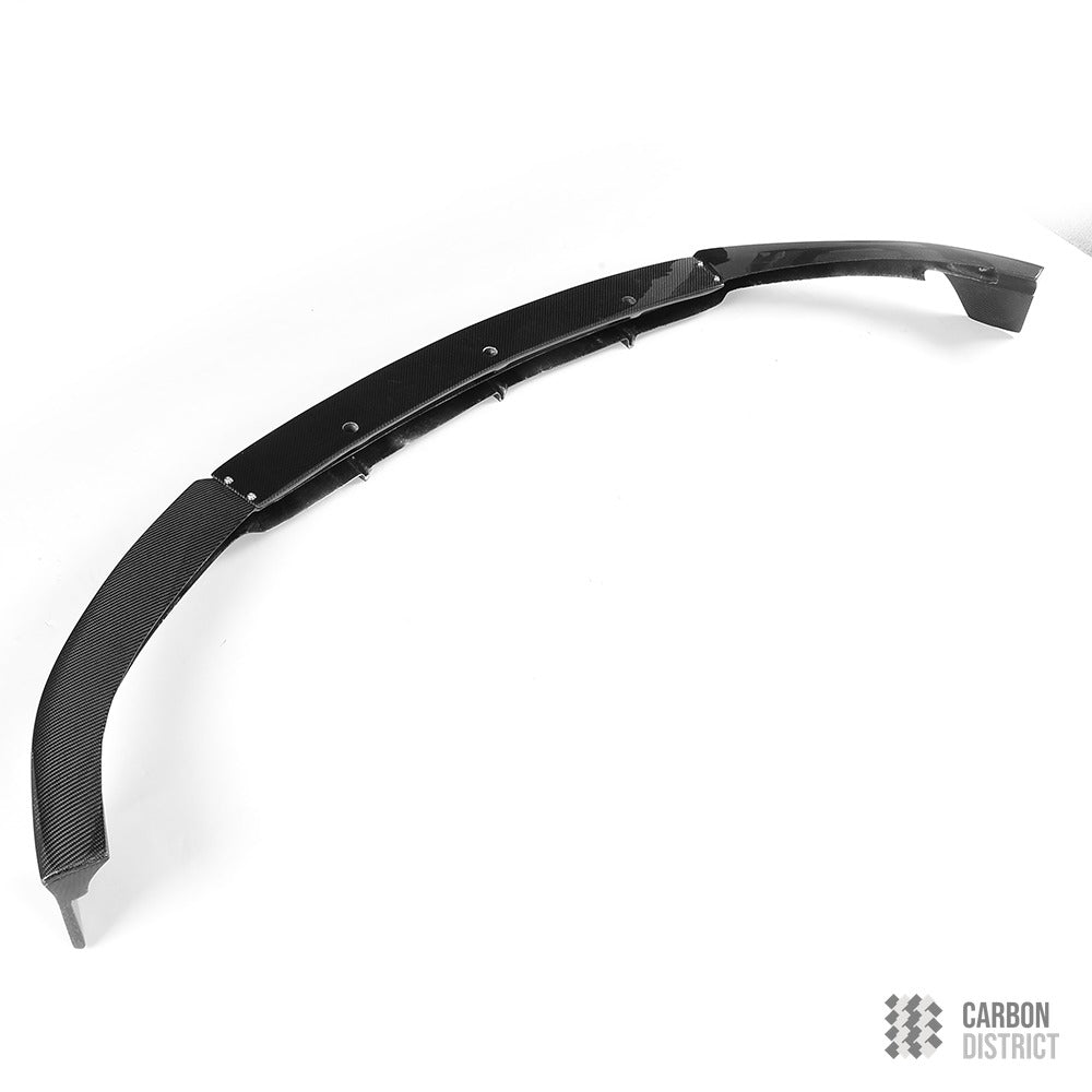 Mercedes C-Class (W205 Coupe) carbon fibre front lip — UV-stable gloss finish detail
