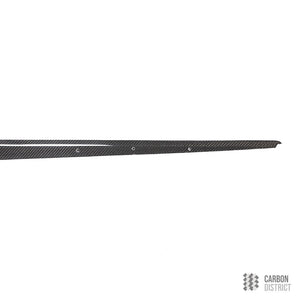 BMW 1 Series (F20) carbon fibre side skirts — UV-stable gloss finish detail