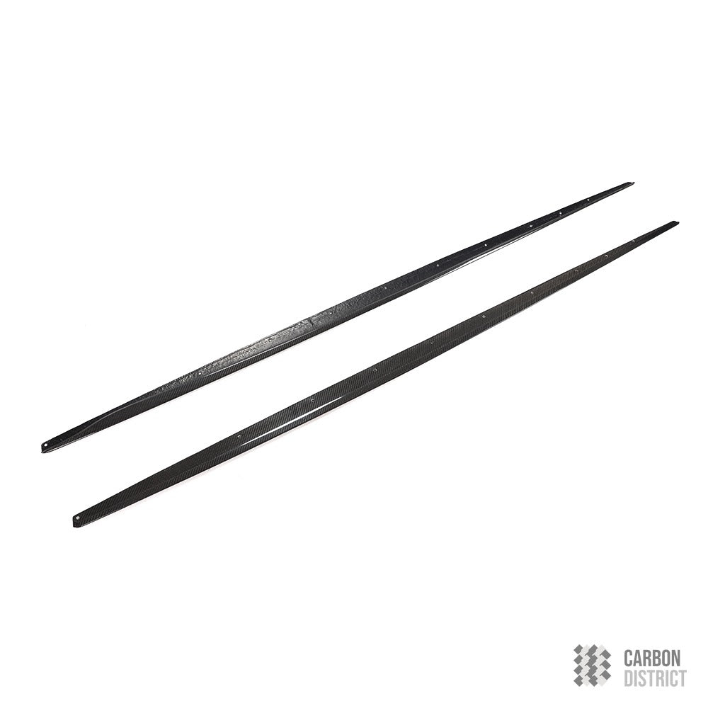 BMW 1 Series (F20) carbon fibre side skirts — 3K twill gloss finish