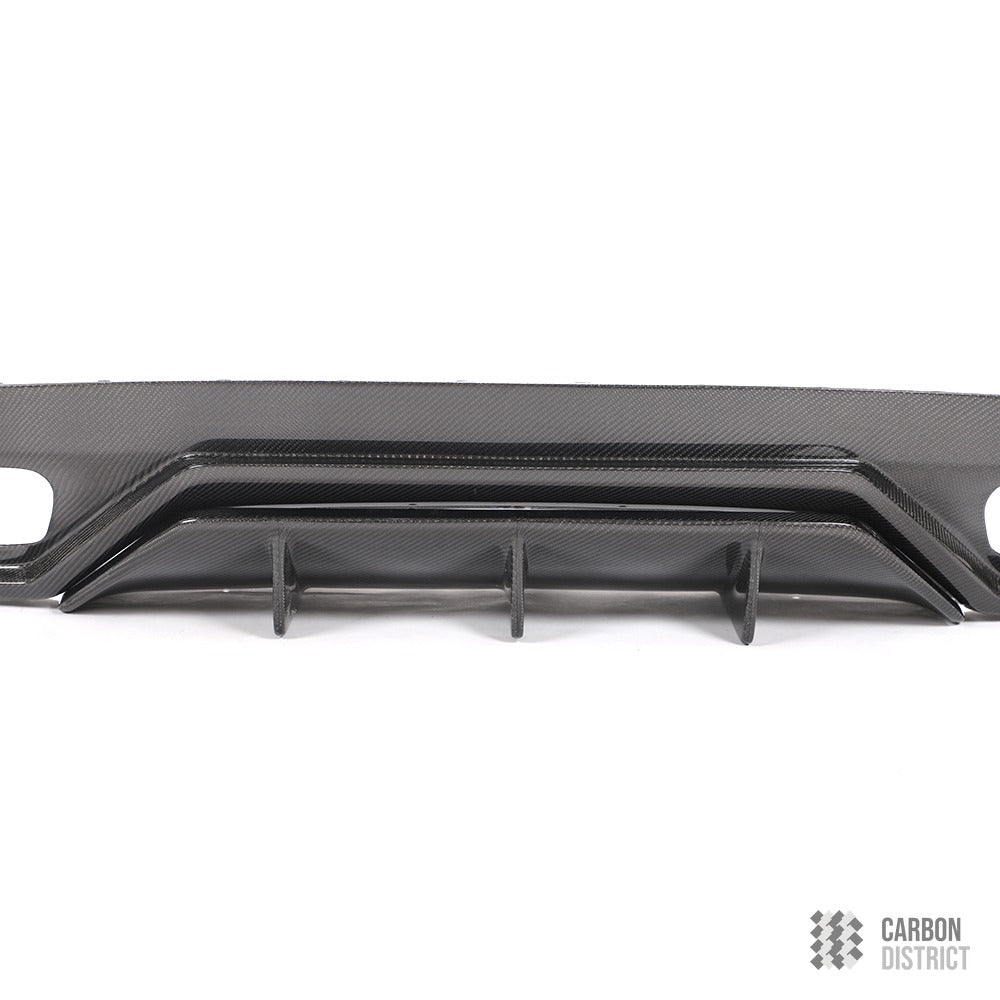 Mercedes A Class (W176) carbon fibre rear diffuser — UV-stable gloss finish detail