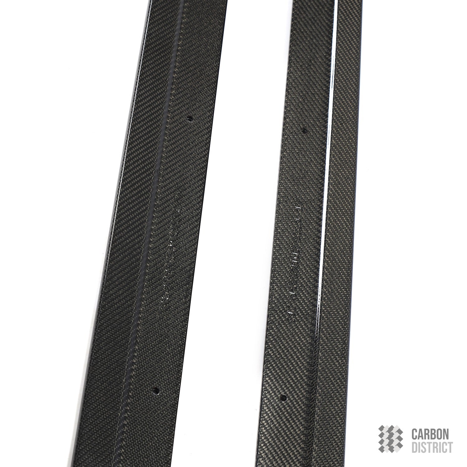 BMW 5 Series (F10) carbon fibre side skirts — UV-stable gloss finish detail