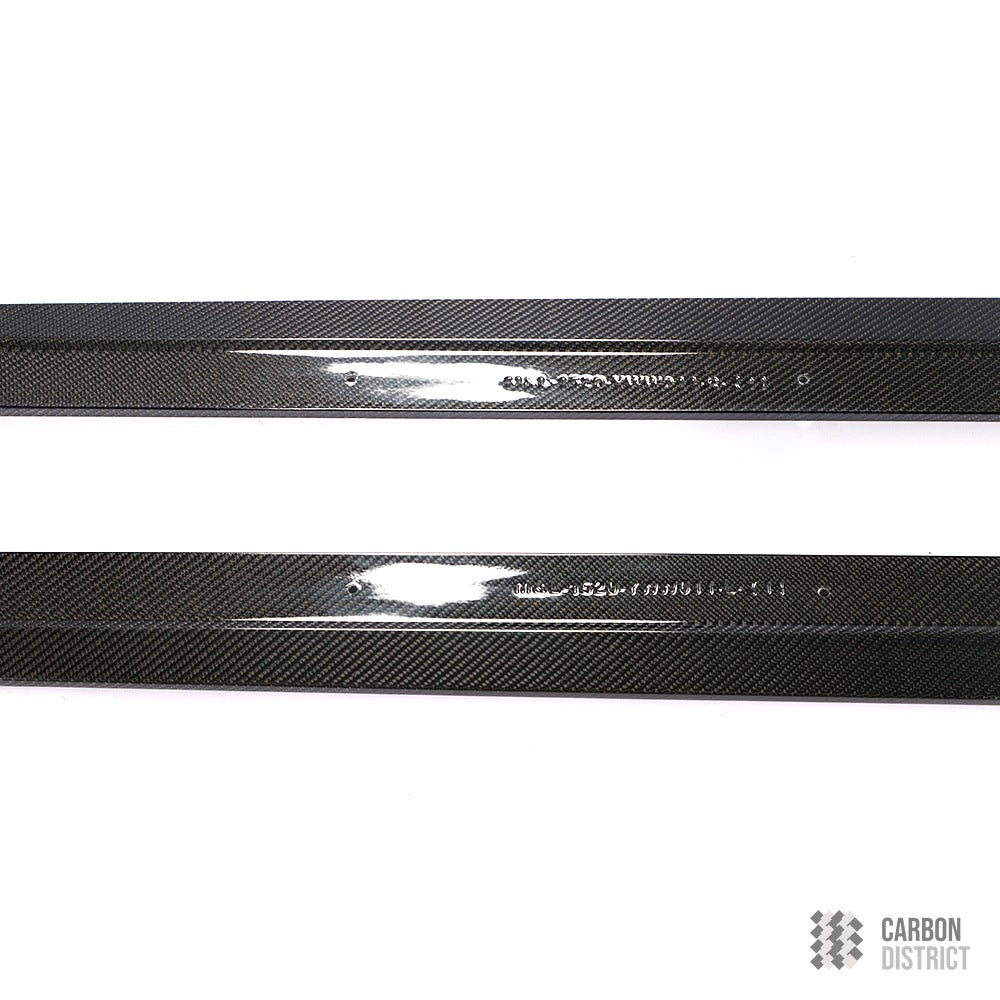 BMW M3/M4 (F8x) carbon fibre side skirts — UV-stable gloss finish detail