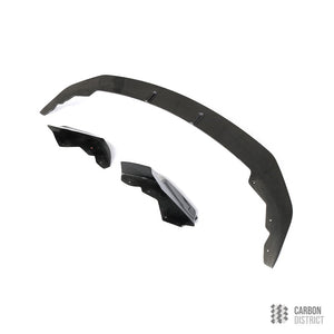 BMW 1 Series (F20) carbon fibre front lip — UV-stable gloss finish detail