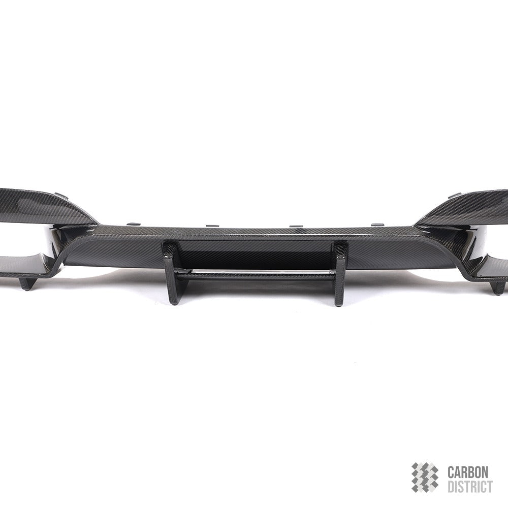 BMW M6 (F06/F12/F13) carbon fibre rear diffuser — UV-stable gloss finish detail