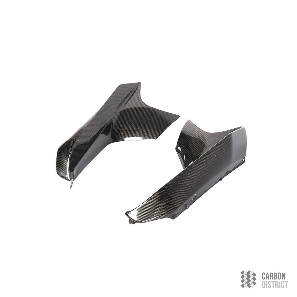 BMW M5 (F90) carbon fibre front splitter winglets — UV-stable gloss finish detail