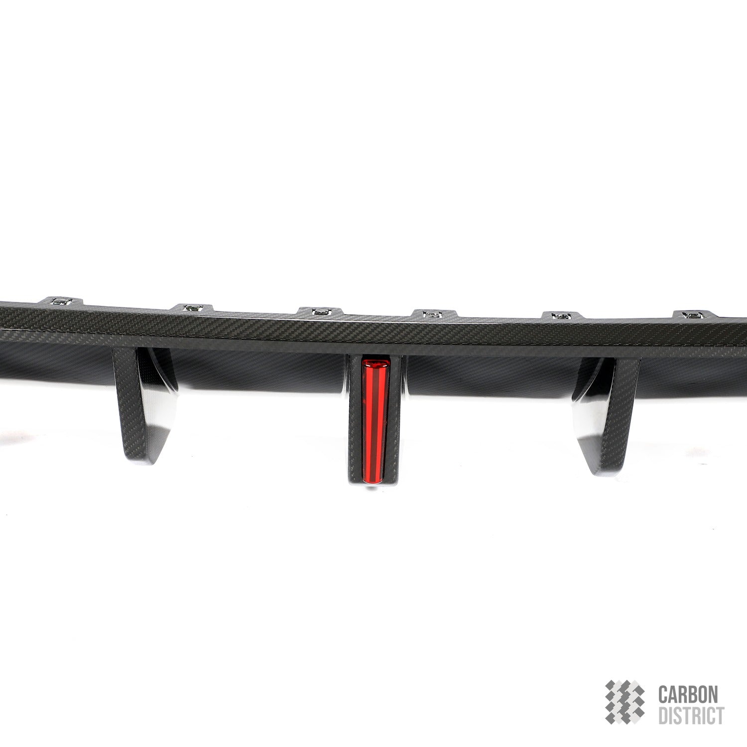 VW Golf Mk8 carbon fibre rear diffuser — UV-stable gloss finish detail