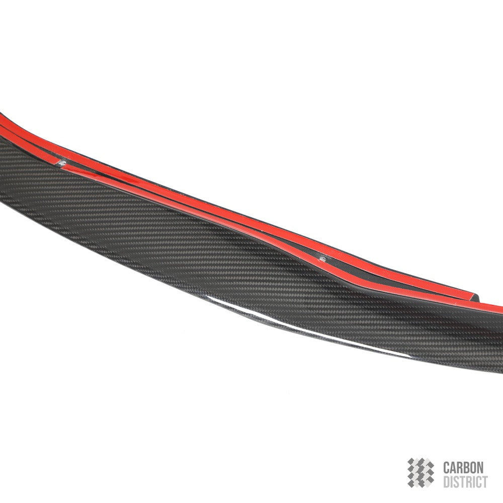 Toyota Supra (A90) carbon fibre front lip — UV-stable gloss finish detail