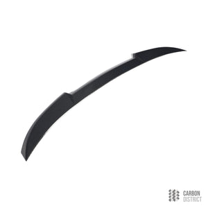 BMW (G90/G60) carbon fibre ducktail spoiler — UV-stable gloss finish detail