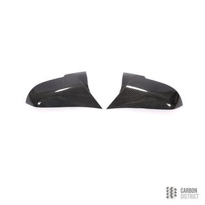 BMW 1 2 3 4 carbon fibre mirror caps — rear three-quarter view