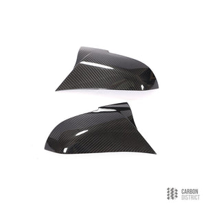 BMW 1 2 3 4 carbon fibre mirror caps — on-car angle