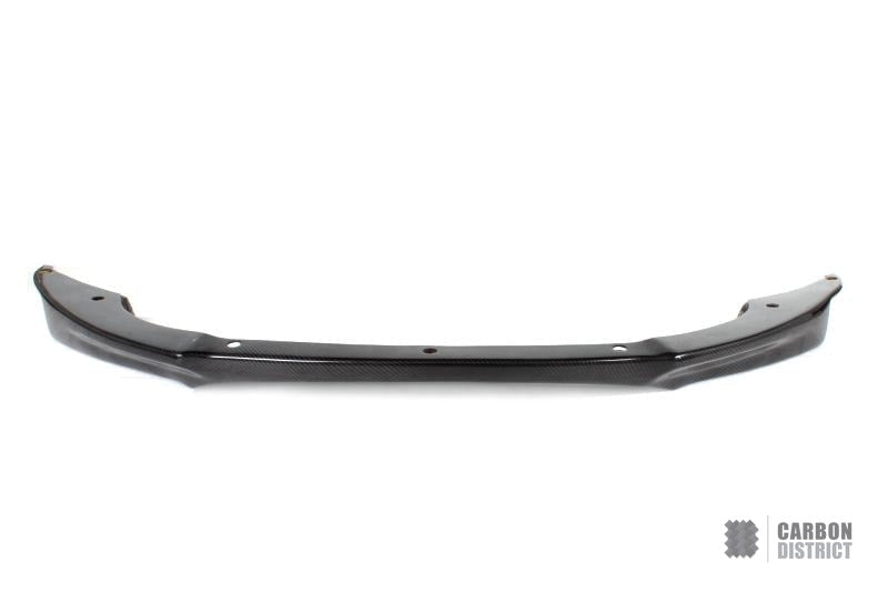 BMW 3 Series (E92) carbon fibre front lip — close-up of the weave