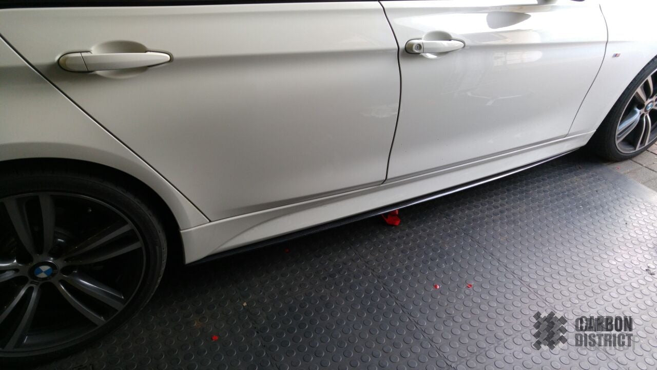 BMW 3 Series (F30) carbon fibre side skirts — 3K twill gloss finish