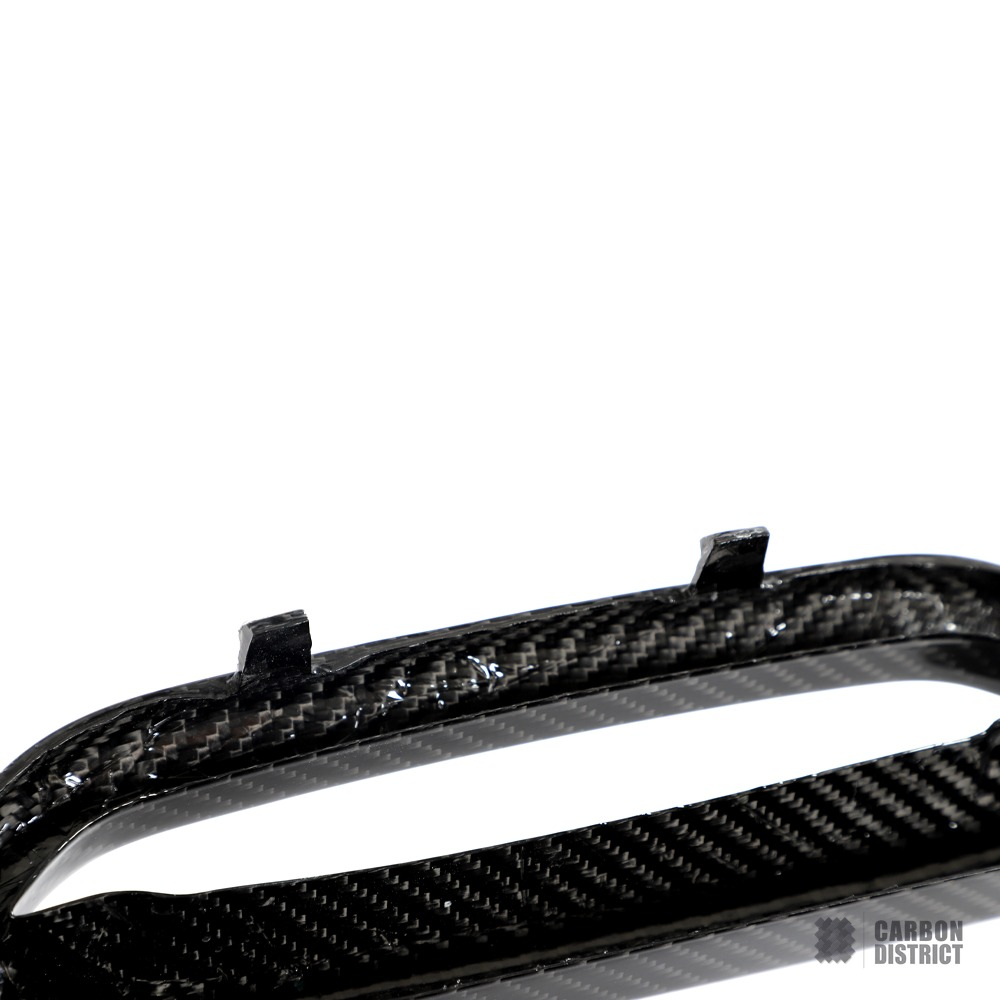 BMW i4 carbon fibre front grille — UV-stable gloss finish detail