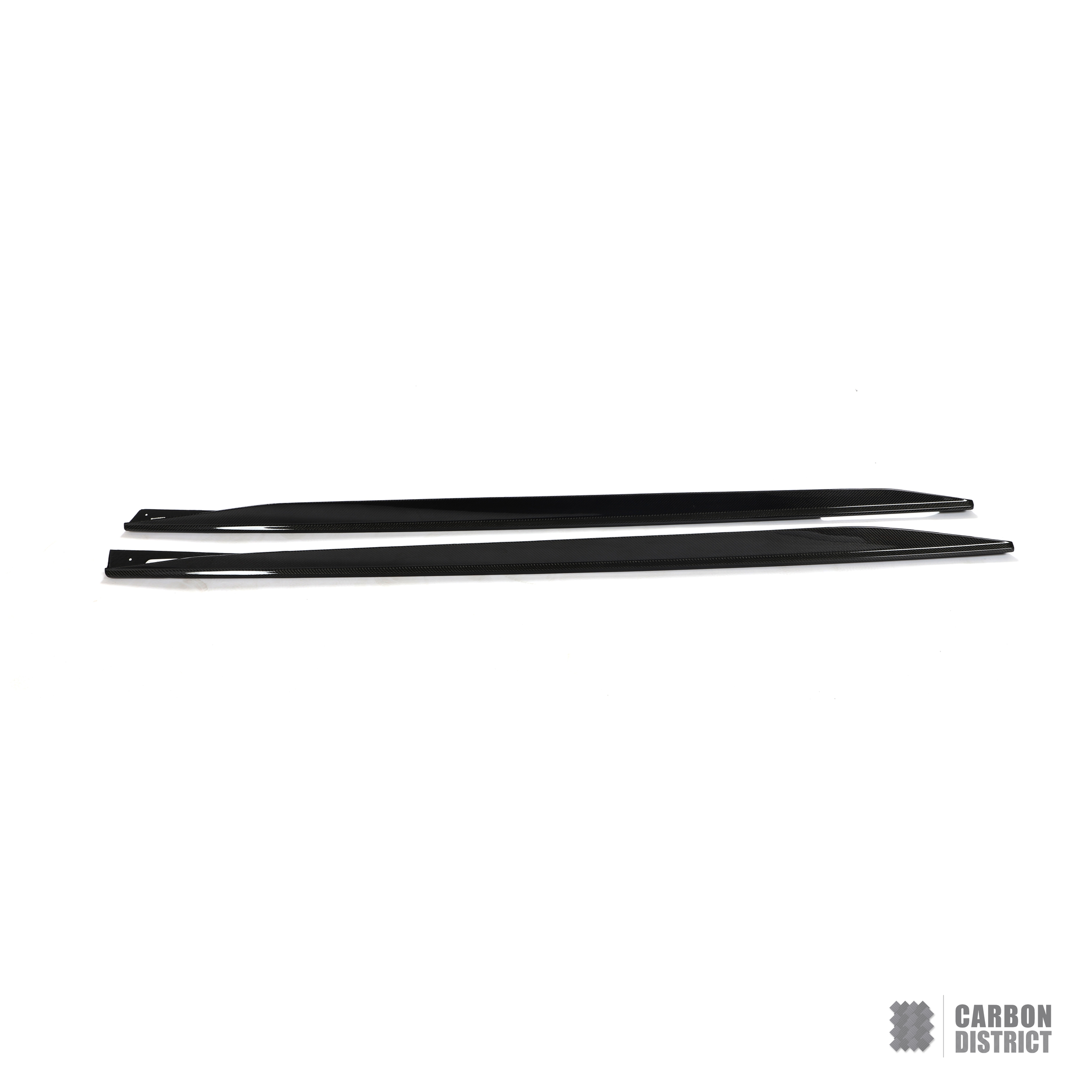 BMW i4 (G26) carbon fibre side skirts — 3K twill gloss finish