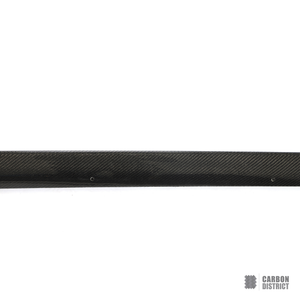 BMW i4 (G26) carbon fibre side skirts — UV-stable gloss finish detail