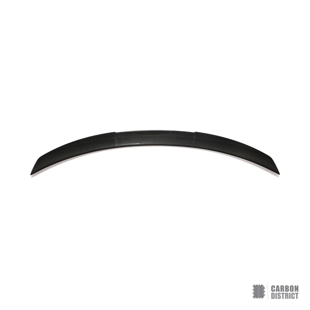 BMW i4 (G26) carbon fibre spoiler — UV-stable gloss finish detail