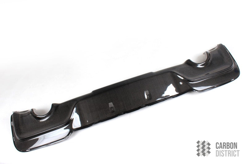 BMW 1 Series (F20) carbon fibre rear diffuser — UV-stable gloss finish detail