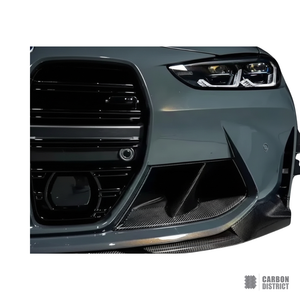 BMW M3 (G80) carbon fibre front bumper inserts — full product view