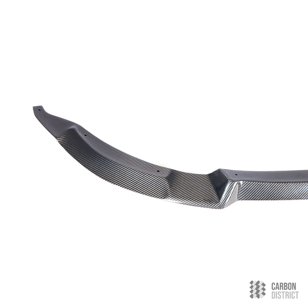 BMW M3/M4 (F8x) carbon fibre front bumper lip — UV-stable gloss finish detail