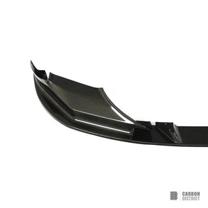 BMW M5 (F90) carbon fibre front lip (V1) — UV-stable gloss finish