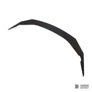 BMW M5 (F90 Facelift) dry carbon fibre front lip — UV-stable gloss finish detail