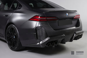 BMW M5 (G90/G99) carbon fibre rear canards — 3K twill gloss finish