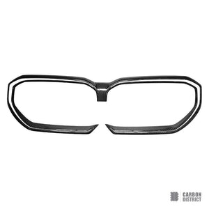 BMW M5 (G90/G99) & 5 Series (G60) dry carbon fibre front grille surround — UV-stable gloss finish detail