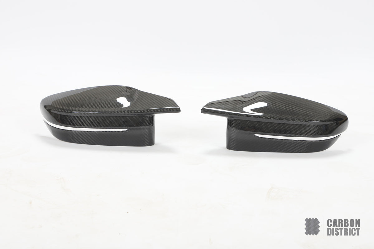 BMW M3/M4 (G81/G82/G83) dry carbon fibre mirror caps — UV-stable gloss finish