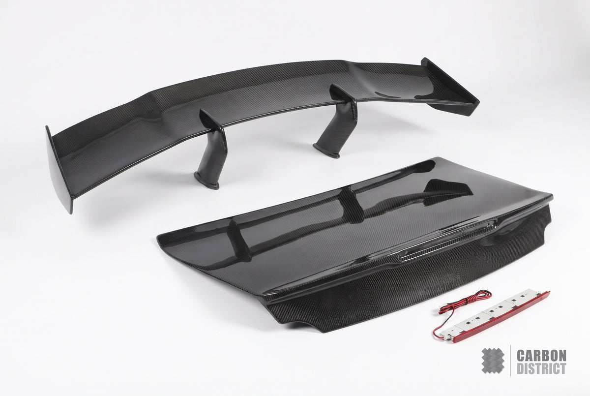 Nissan GT-R R35 Nismo style carbon fibre rear wing and boot lid, white studio product shot