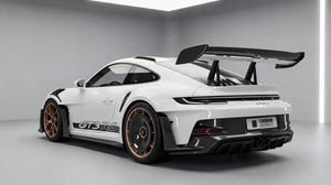 Porsche 911 GT3 RS (992) dry carbon fibre body kit, rear three-quarter showing the wing end plates, rear bumper, diffuser and rear wheel carbon aero disc